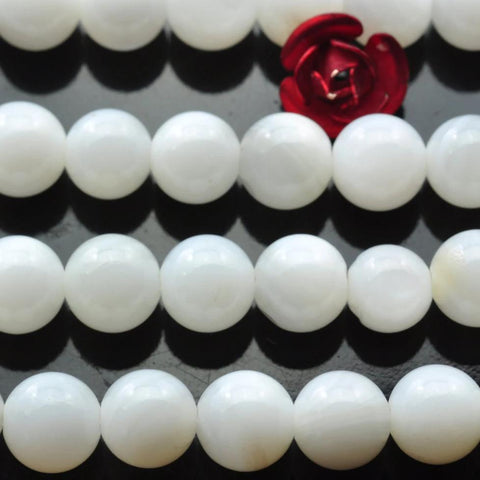 64 pcs of white color Shell smooth round beads in 6mm