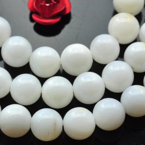 64 pcs of white color Shell smooth round beads in 6mm