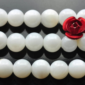 64 pcs of white color Shell smooth round beads in 6mm