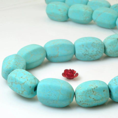 23 pcs of Chinese Turquoise matte drum beads in 11x15mm