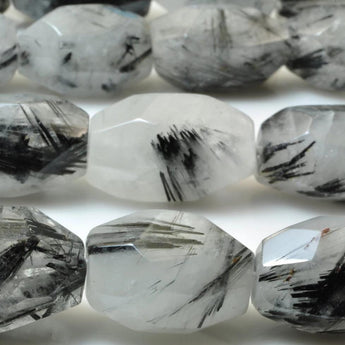 A grade 15 inches of Natural Black Rutilated Quartz faceted nugget beads in 13-15 width X 20-25mm length